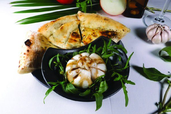 Creamy burrata on fresh rocket