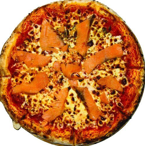 Salmon pizza on a wooden paddle